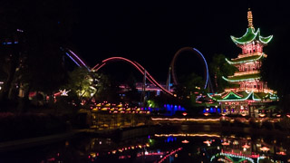 Dæmonen, roller coaster at the Tivoli Gardens amusement park by night, Copenhagen, Denmark